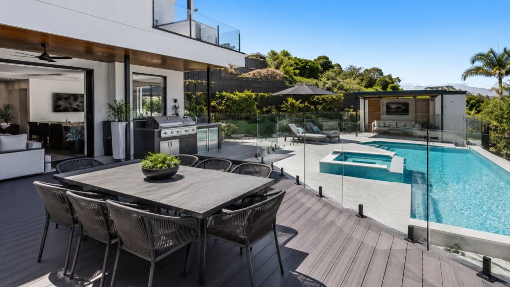 Modern composite poolside deck designed for outdoor entertaining at a Gold Coast home.