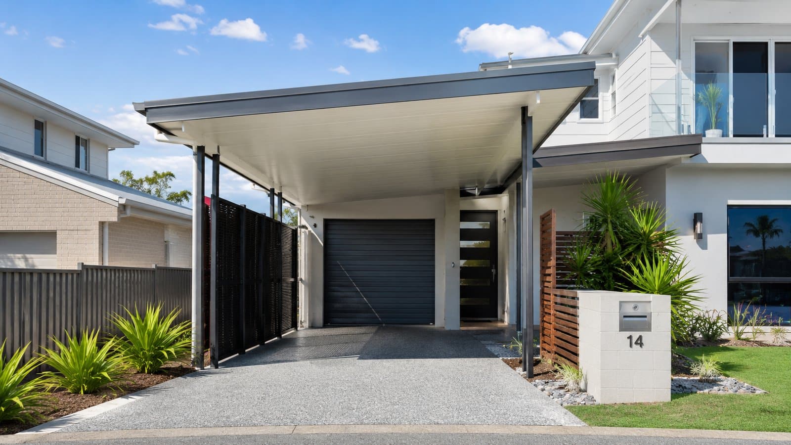 Carports for Narrow Blocks: Space-Saving Hacks That Work 1 Modern narrow-block home with a sleek attached carport and slim steel framing.