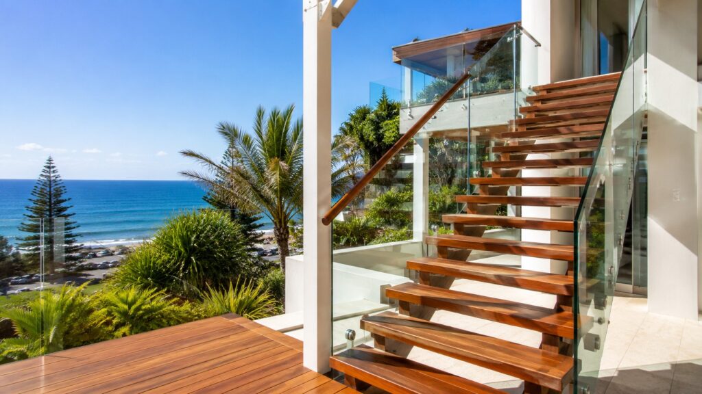 Coastal outdoor staircase built with durable materials overlooking the ocean.