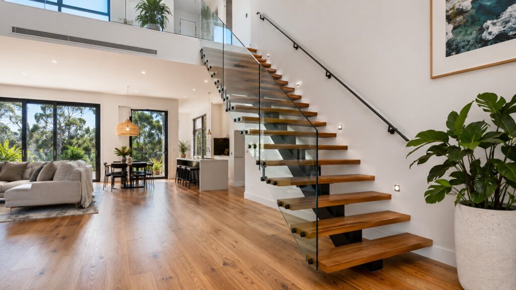 Contemporary floating timber staircase inside a modern Southport home.