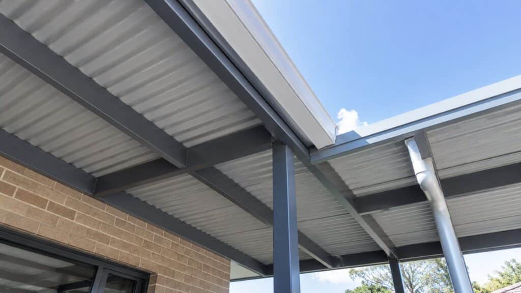 When a Patio Extension Makes More Sense Than a Full Outdoor Room 2 Seamless connection between an existing patio roof and a matching new extension.