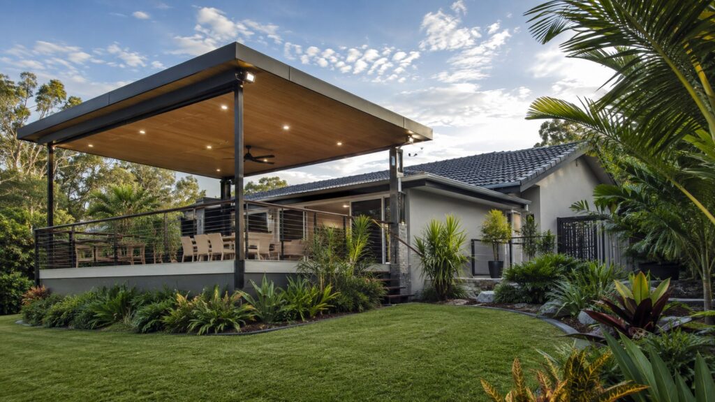 Flyover patio roof elevated above the existing home roofline for extra height and airflow.